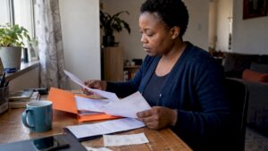 Consumer checking paid-up and payment records